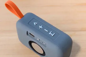Detail shot of the portable wireless bluetooth speaker showing control buttons and ports.