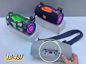 Portable Bluetooth speaker with colorful LED lights, dual speakers, and convenient carrying strap.