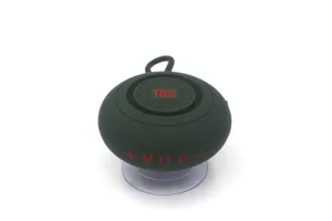Tragbarer Bluetooth Lautsprecher Detailansicht, dunkelgrünes kleines rundes Design mit Saugnapf.