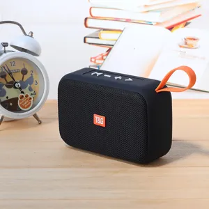 Portable wireless bluetooth speaker with deep bass, card slot, and handy outdoor orange strap.