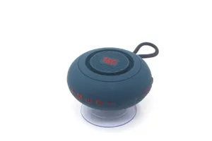 Tragbarer kabelloser Bluetooth-Lautsprecher mit Saugnapf und kompaktem Design für Musikgenuss.