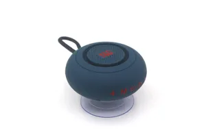 Nahaufnahme des tragbaren blauen Bluetooth-Lautsprechers mit Saugnapf und Bedientasten.