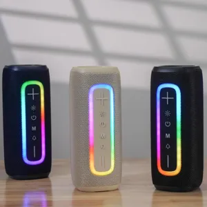 Portable wireless Bluetooth speaker with RGB ambient light and deep bass for outdoor use.