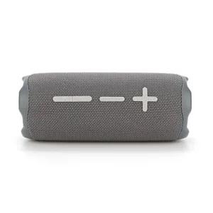 Portable wireless bluetooth speaker with fabric mesh and heavy bass sound details.