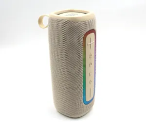 Close-up detail of portable Bluetooth speaker with fabric mesh and RGB light strip.