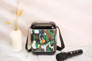 Portable camo bluetooth karaoke speaker with microphone for outdoor party and music fun.
