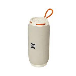 Portable wireless bluetooth speaker featuring fabric mesh and orange lanyard strap.