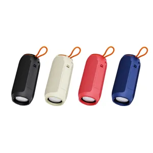 Portable wireless Bluetooth speaker with heavy bass, cylindrical design and handy strap.