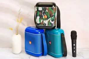 Portable outdoor bluetooth speaker with microphone, wireless stereo sound and colorful design.