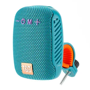 Tragbarer Outdoor Bluetooth Lautsprecher mit Fahrradhalterung und teal Mesh Design.