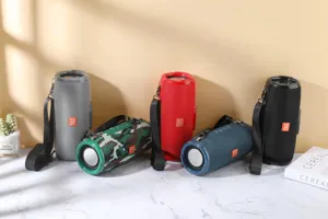 Portable fabric bluetooth speaker outdoor waterproof subwoofer with dual diaphragms and strap.
