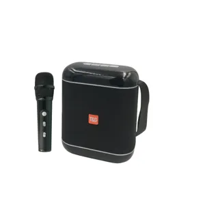 Portable karaoke Bluetooth speaker and microphone set detail view, featuring compact black design.