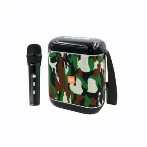 Portable Bluetooth karaoke speaker with wireless microphone, outdoor camo design, heavy bass.