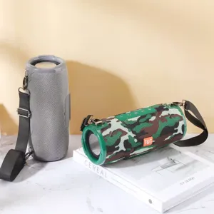 Portable wireless Bluetooth speaker with dual diaphragms, waterproof outdoor design and strap.