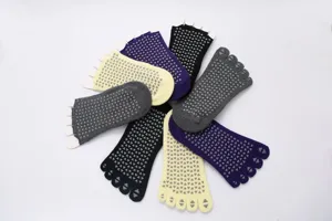 Non-slip five-toe yoga socks with silicone grips, breathable for pilates & fitness.