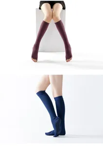 Comfortable over-the-knee five-toe yoga socks with anti-slip grip dots for dance and fitness workouts.