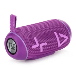 Altoparlante Bluetooth wireless portatile viola con trama in tessuto e comodo laccio vista
