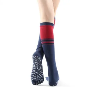 Over-the-knee yoga socks with anti-slip grip and five-toe design for dance and fitness.