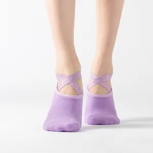 Light purple yoga socks with cross straps and non-slip loop sole for women dance fitness.
