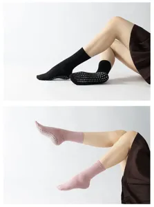 Close-up detail of non-slip yoga pilates socks with grip dots for better stability during workout.