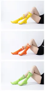 Detailed close-up view of women's anti-slip yoga socks featuring elegant decorative ribbon straps.