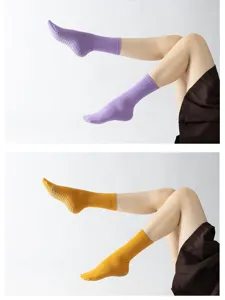 Non-slip yoga socks with grip dots for women pilates fitness workout and daily use.