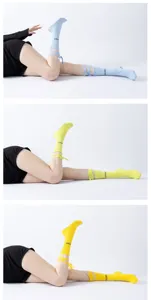 Detailed view of women's anti-slip yoga socks with stylish ribbon ankle ties for pilates fitness.