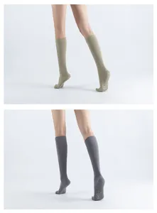 Comfortable mid-tube non-slip yoga pilates socks with grip dots for stable workouts.