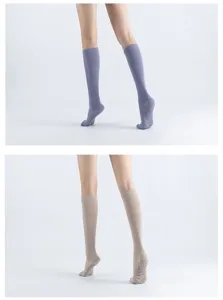 Non-slip yoga pilates socks detail view, showing ribbed texture and grip dots for safety.