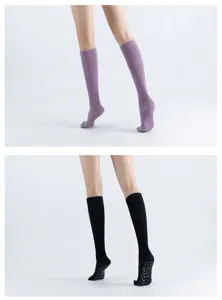 Knee high non slip yoga socks with grip for pilates, fitness and workout sports wear.