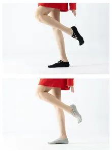 Strappy five-toe yoga socks detail view, anti-slip grip design for pilates and fitness training.