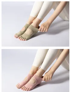 Close-up details of non-slip five-toe yoga socks, open-back pilates design for women comfort.
