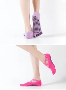 Calcetines de yoga antideslizantes para dedos con tiras cruzadas y silicona.
