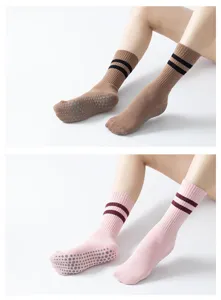 Detailed view of non-slip grip yoga socks with double stripes and terry sole for better traction.