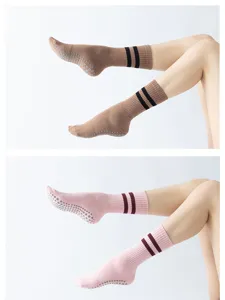 Non-slip grip yoga pilates socks detail view, featuring cozy terry fabric and double stripe design.