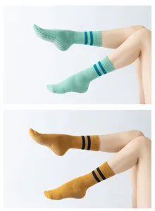 Non-slip yoga pilates socks with grip dots and striped cuffs for women workout sports.