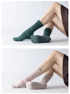 Close-up detail of women non-slip grip pilates yoga socks with thermal terry fleece design.