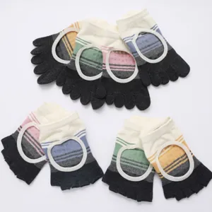 Color-blocked open back yoga five-toe socks detail, anti-slip design for women fitness.