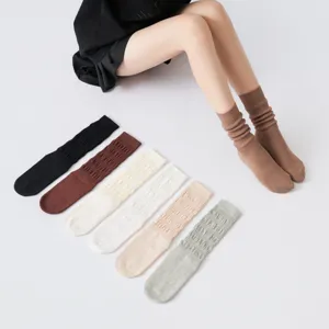 Cozy women's slouch socks for yoga and daily wear, comfortable knit long tube socks.