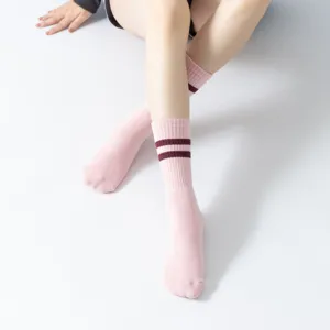 Comfortable long pink athletic crew socks with double stripes for yoga, pilates and daily wear.