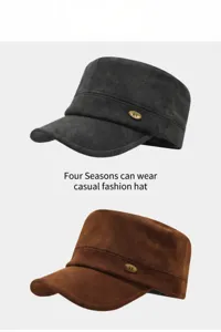 Detailed view of stylish suede flat caps in dark grey and brown colors with metal accent.