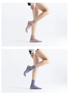 Detailed view of striped five-toe yoga socks, comfortable and breathable fit for daily use.