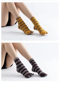 Striped five-toe yoga socks with cute cat details, non-slip grip soles for pilates and dance.