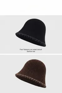 Λεπτομερής όψη casual πλεκτού καπέλου bucket με ορατή ραφή γείσου, εξαιρετική υφή.
