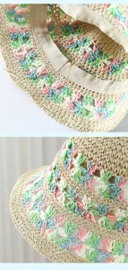 Detalle de sombrero de paja de ganchillo, sombrero de pescador floral, sombrero de playa.