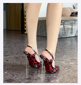 Detailed view of sexy red and black leopard print high heels with metal stiletto and slingback.