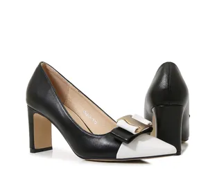 Black and white color block high heels, elegant pointed toe design with a chic bow detail for women.
