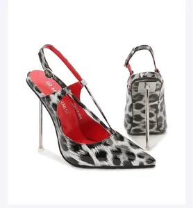 Black and white leopard print slingback high heels with metal stiletto heel and red insole.