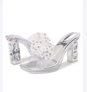 Detail view of crystal rhinestone chunky transparent mules, open-toe high heels for women.