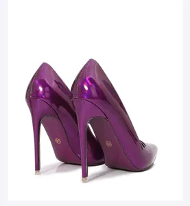 Close-up detail of glossy purple pointed-toe stiletto high heels showing fine craftsmanship.